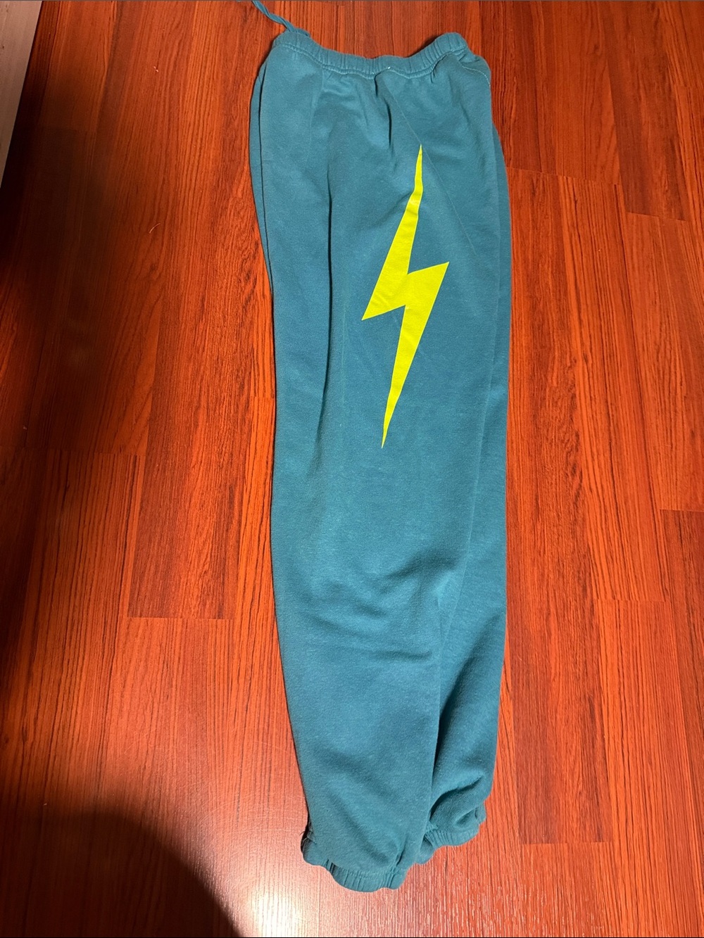 Aviator Nation Teal Track Pants with Yellow Lightning Graphic
